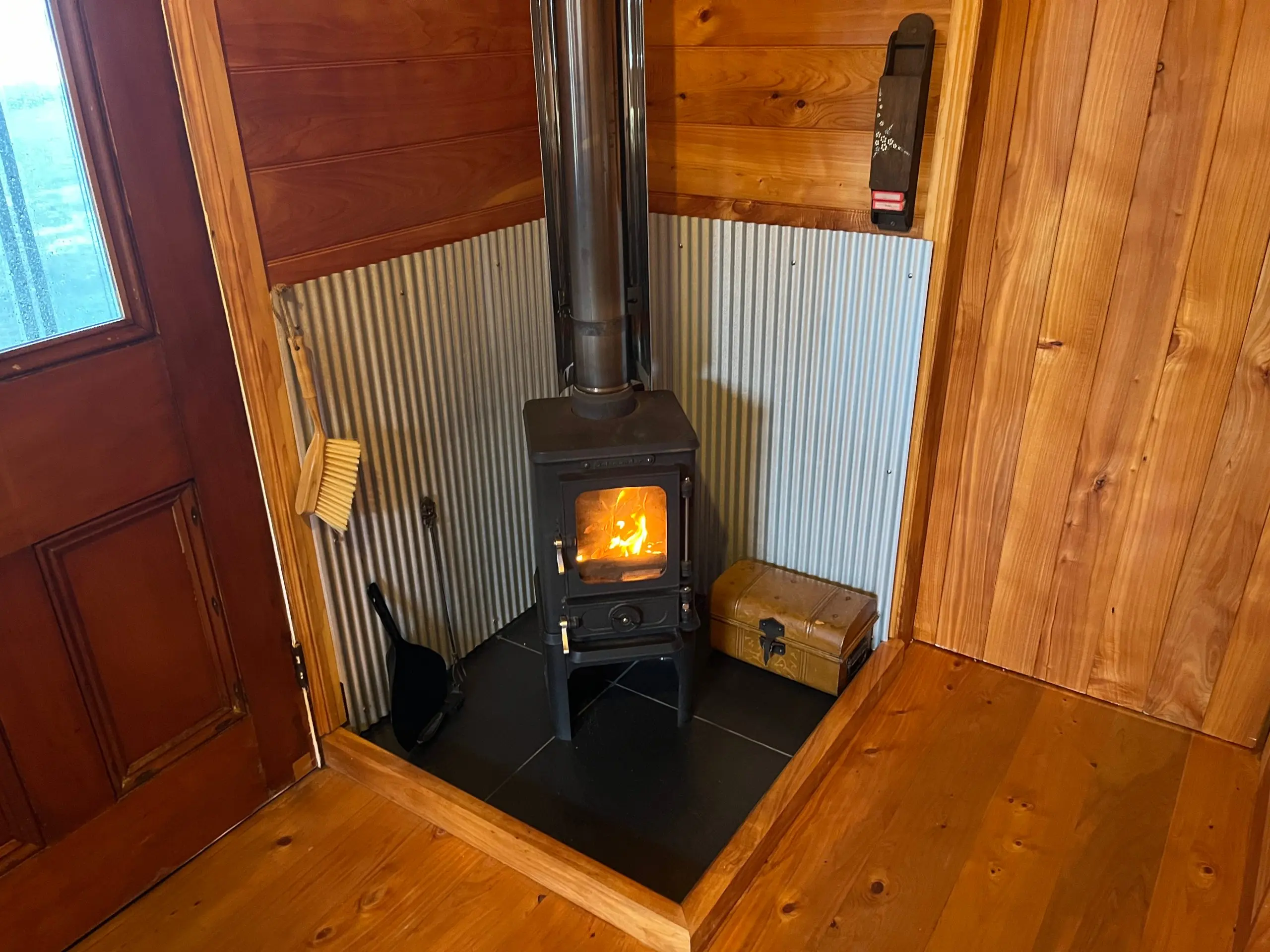 Cape Foulwind Cabin fireplace